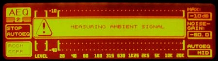 DEQ2496 display showing the MEASURING AMBIENT SIGNAL message.